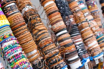 Many various leather and textile bracelets