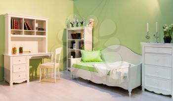 Nice spacious child room in a green color
