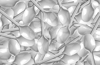 Many white plastic spoons. Use for background or texture
