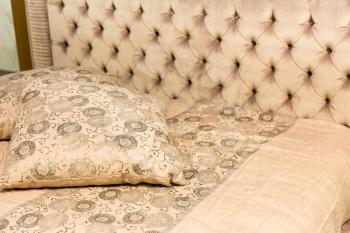 Closeup of a bed with pillows 