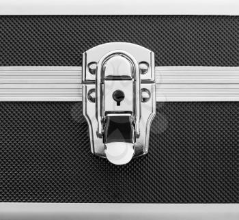 Closeup of lock on a metal briefcase