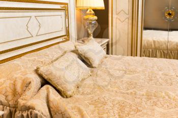 Classical luxury bed with pillows closeup