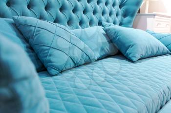 Closeup of a modern blue sofa