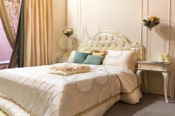 Vintage bedroom interior. Bed and pillows