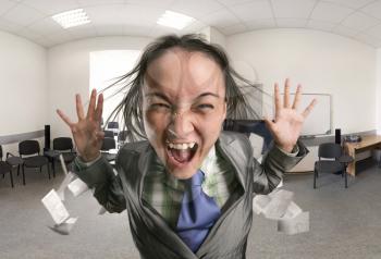 Shouting, crazy, irritated woman in the office