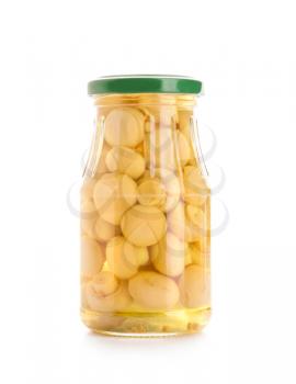 Glass jar canning mushrooms. Isolated over white background.