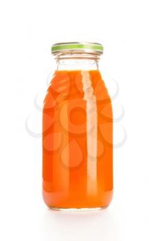 Glass bottle of fruit juice. Isolated over white background.