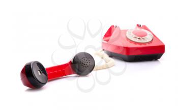 Red telephone with handset in front