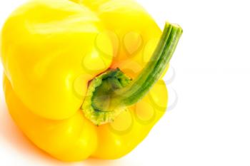 Glossy yellow Pepper. Isolated over white. Fresh vegetables.