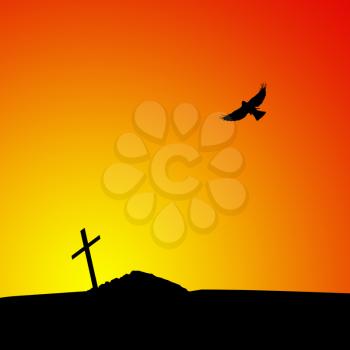 Silhouette of grave with cross at sunset