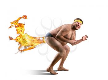 Naked freak farts by fire isolated on white