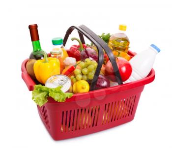 Basket full off fruits and vegetables. Food set. Isolated over white