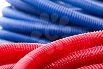 Closeup of long red and blue water pipes