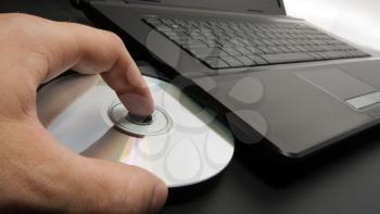 Loading CD - DVD into laptop