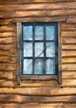 Vintage window on wooden wall