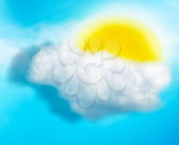 Sun in the cloud over clear blue sky