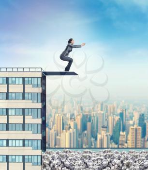 Woman on the edge of a high building is going to jump to paperwork