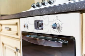 Closeup picture of  white oven in kitchen interior design