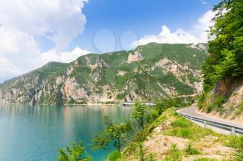 Nice panorama view of blue sea, mountains and road