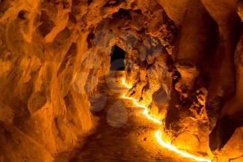 Underground cave with artificial lights down