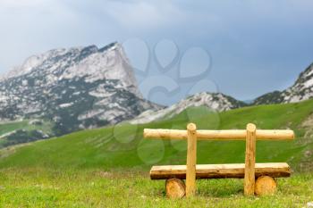Wooden bench in National Park in mountains of Montenegro, Europe