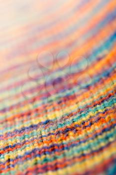 Knitted multicolored scarf. Closeup view
