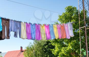 Colorful linen drying on the nature, summer time