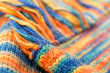 Knitted multicolored texture with fringes