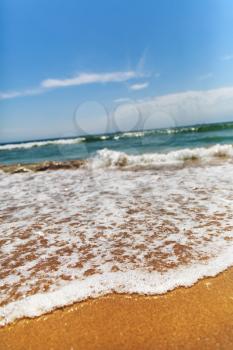 Wave of the sea on the summer beach, Portugal
