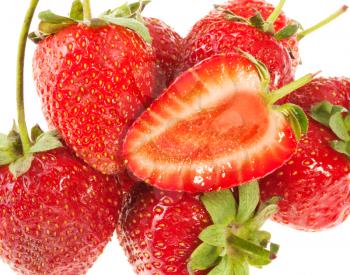 Group of fresh ripe strawberries on white