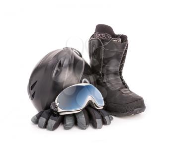 Winter sport glasses, snowboarding boot, helmet and gloves on white