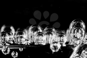 Extra close-up of bubbles under water. In B/W