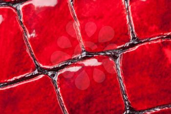 Close-up of red artificial leather background