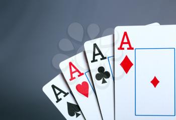Closeup of four aces. Toned image