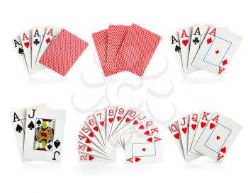 Combinations of playing cards on white background