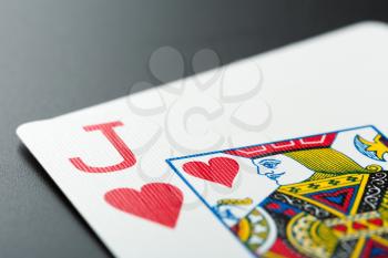 Playing card on grey background 