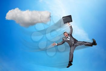 Businessman is falling in the sky