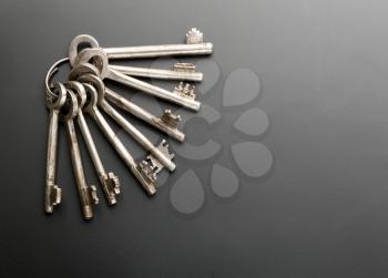 Bunch of keys on grey background