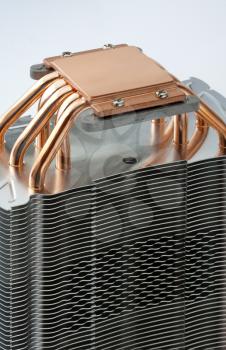Close-up of modern computer processor cooler with copper pipes