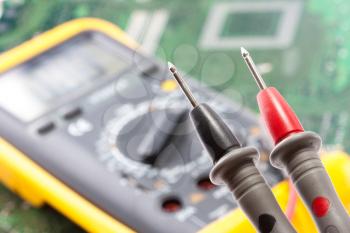 Closeup view of probes of the multimeter 