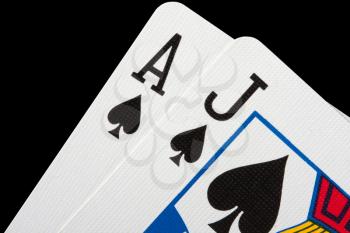Close-up of blackjack cards isolated on black