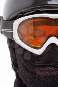 Close-up of snowboarder in balaclava looking through glassess