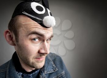 Portrait of funny man in rabbit hat