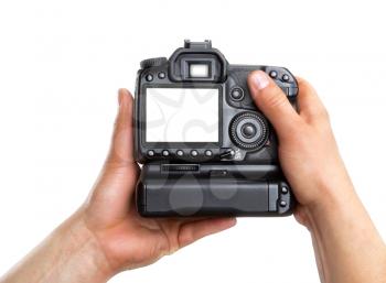Hands holding digital camera isolated on white