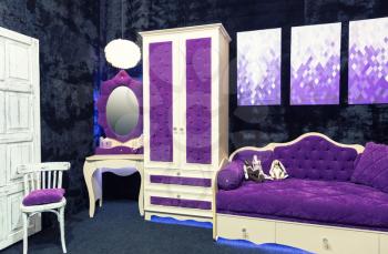 Nice luxury purple sofa in modern interior