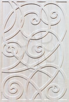 Wooden white decorated facade of furniture closeup