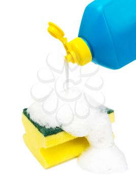 dishwashing liquid bottle and sponge covered with foam