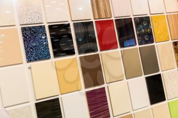 Samples of a ceramic tile in shop on the wall