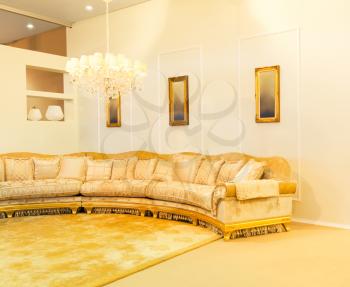 Luxury beige interior with nice big sofa