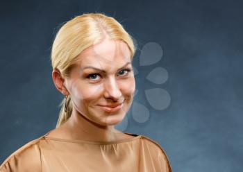 Portrait of smiling blonde beautiful woman